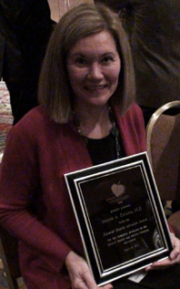 Jeanne with Award rev